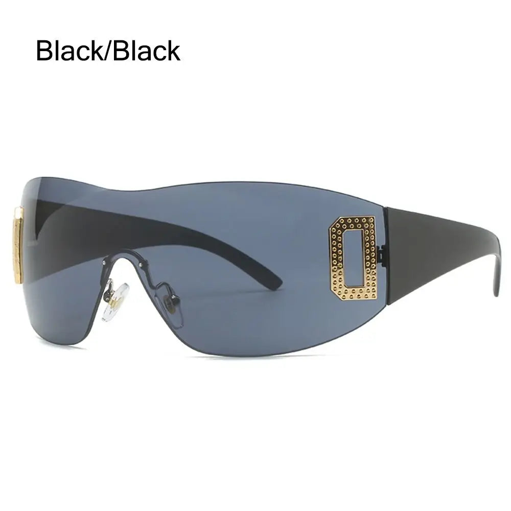 Black oversized sunglasses with gold studded detail, stylish sun protection