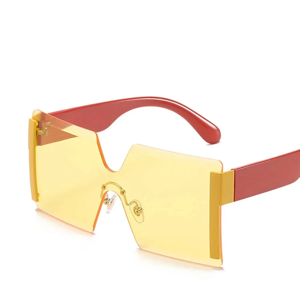 Trendy yellow-tinted sunglasses with red frames, stylish summer accessory