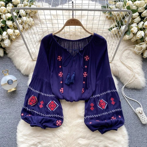 Concierge Tiers: Blue embroidered boho blouse with red patterns, balloon sleeves, relaxed fit