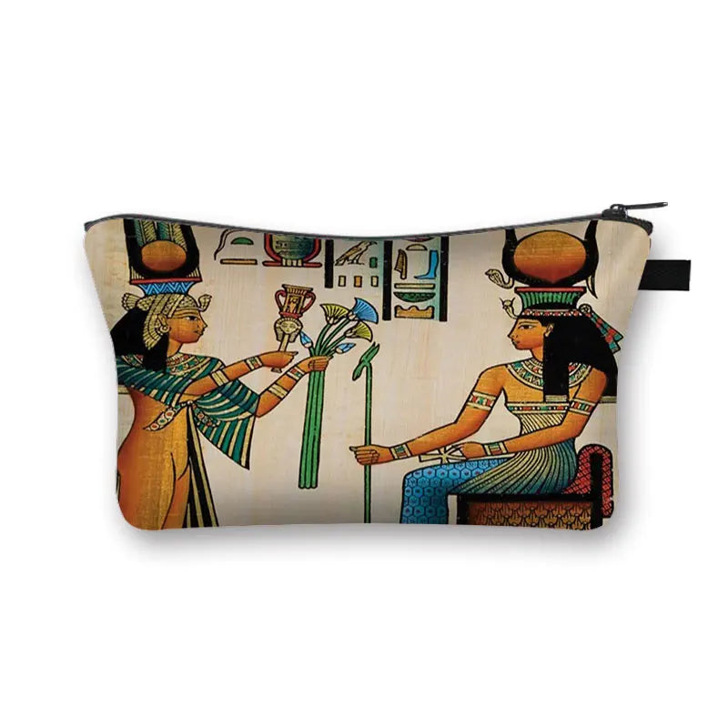 Egyptian-themed cosmetic bag with hieroglyphic art, goddess figures, and floral motifs for travel or daily use