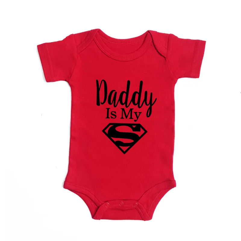 Red baby onesie with 'Daddy Is My Superman' graphic, soft cotton infant bodysuit for cozy comfort