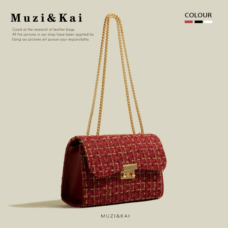 Concierge Tiers display with a red textured handbag and gold chain strap on neutral background.