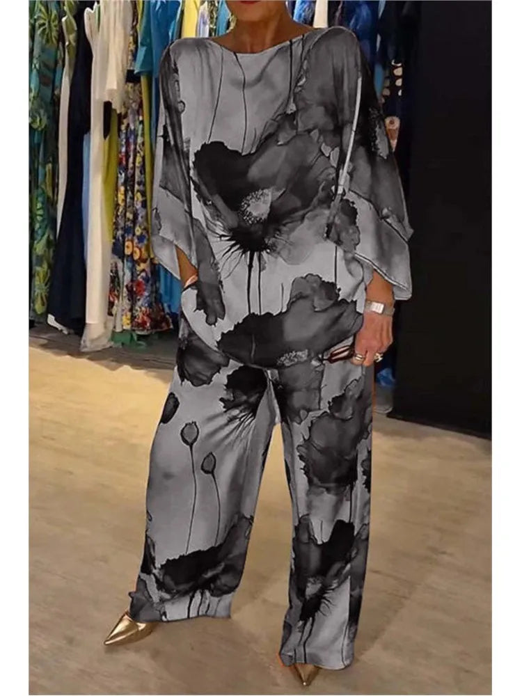 Sexy Summer Fashion Printed Satin Two Piece Set for Women with 3/4 Sleeved Top and Wide Leg Long Pants Casual Style