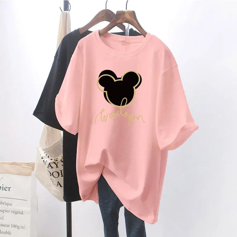 Pink oversized t-shirt with Mickey Mouse head graphic, gold script, cozy loungewear style