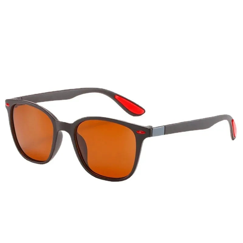 Stylish brown-tinted sunglasses with red-accented arms, perfect for casual wear