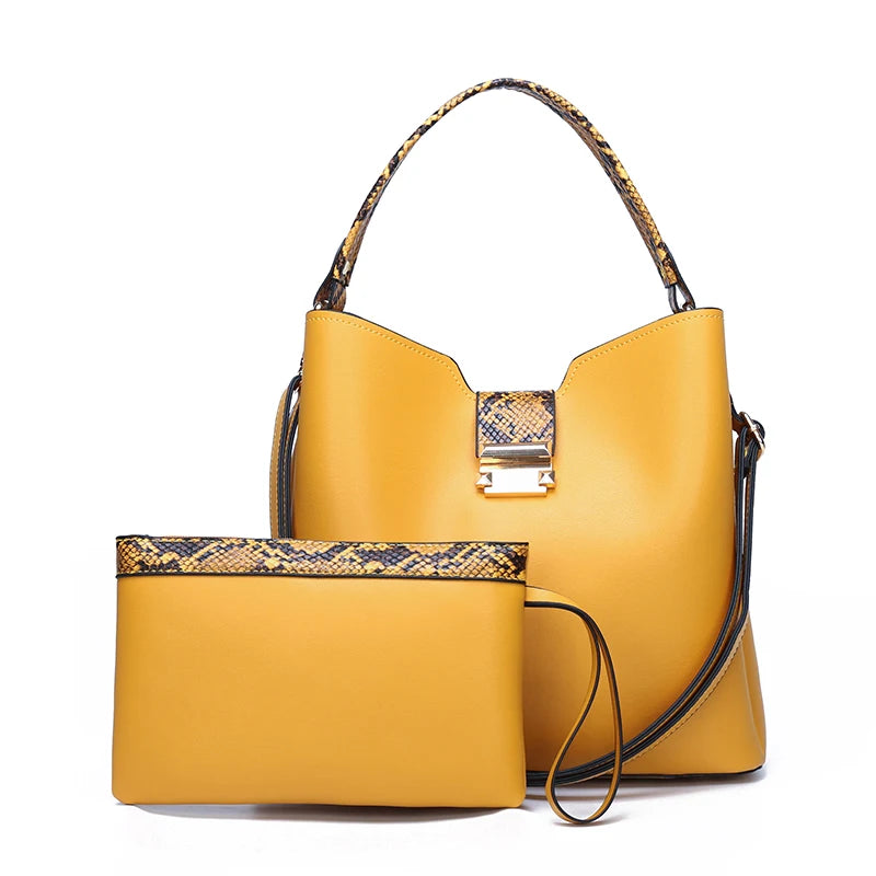 Concierge tiers shown with yellow handbag and matching snakeskin-trimmed pouch