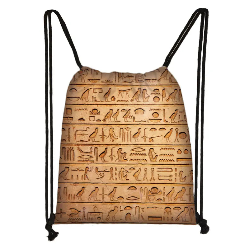 Drawstring bag with Egyptian hieroglyphics print, beige fabric, black straps