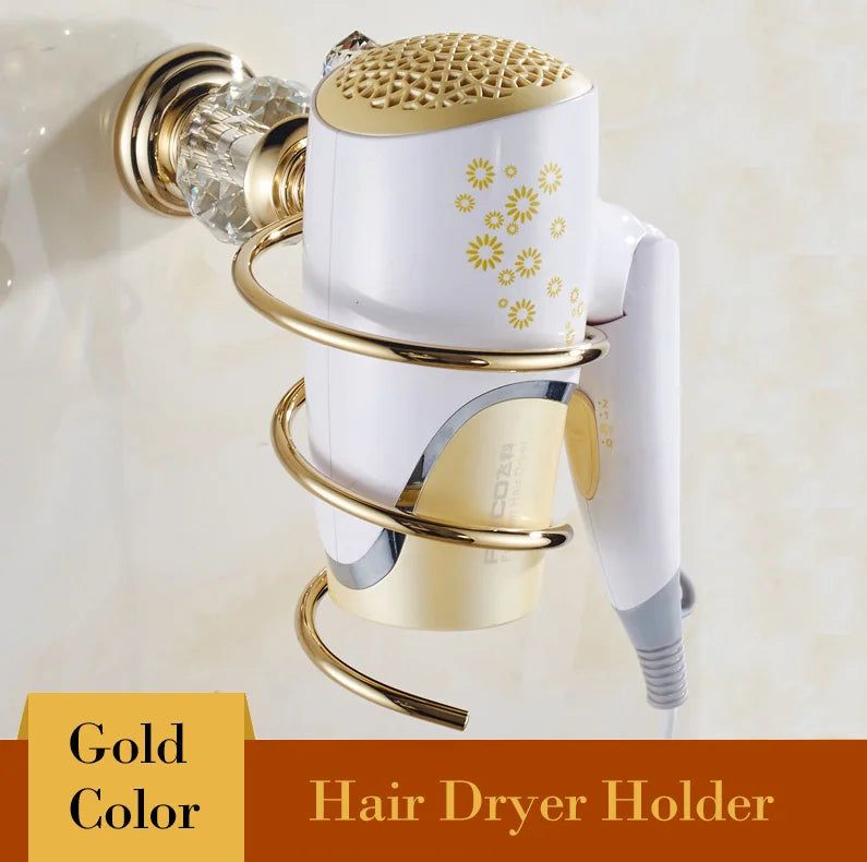 Gold wall-mounted hair dryer holder with white dryer, floral design, crystal accent