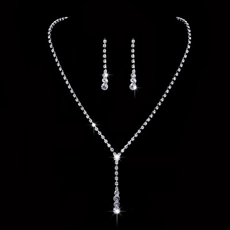 Concierge Tiers display with sparkly rhinestone necklace and matching drop earrings on black background